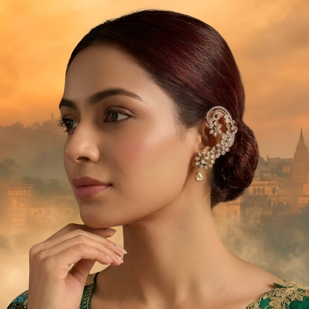Gold-plated Kundan ear cuff earrings with floral crystal design and teardrop danglers for women