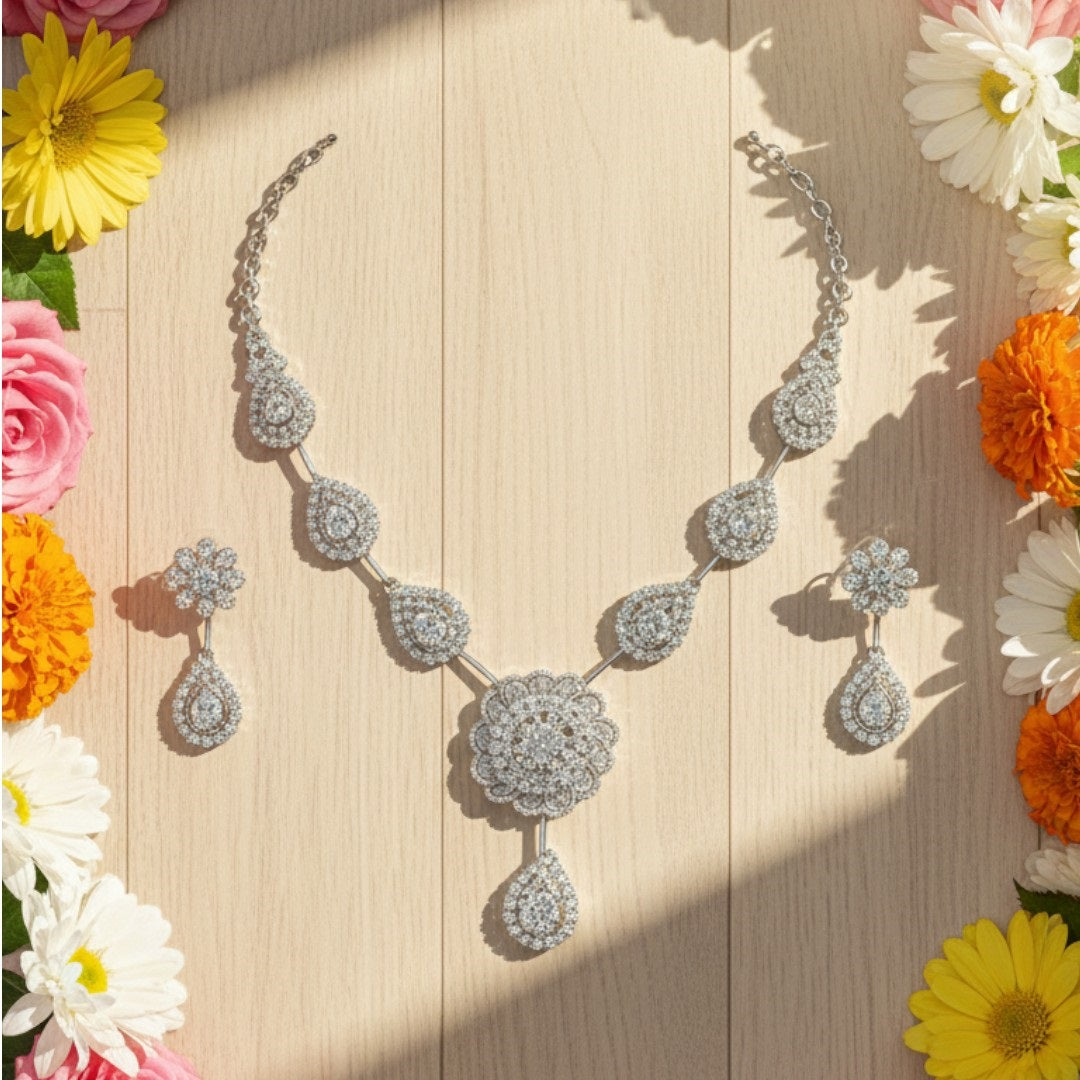 Floral design silver-plated necklace and earrings set for bridal and special occasions.