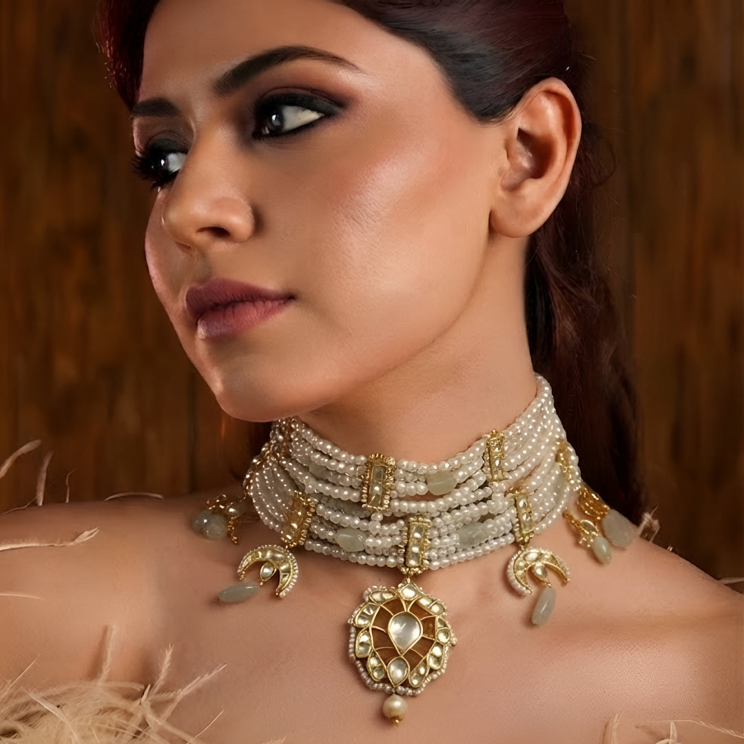 Traditional white pearl Kundan choker necklace for women with gold-plated pendant, bridal wedding jewellery.