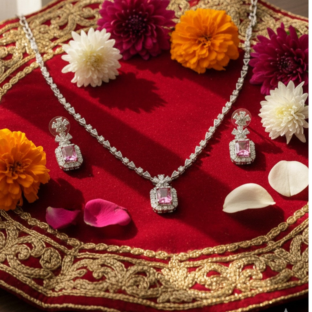 Elegant diamond-style necklace and earring set for weddings and special occasions.
