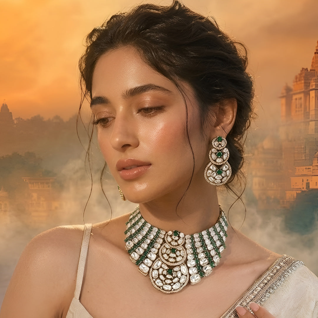 Luxury Kundan Polki necklace set with matching earrings featuring uncut Polki diamonds, green emerald accents, and traditional bridal jewelry craftsmanship in a gold finish.