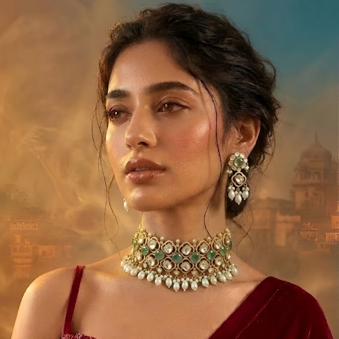 Mint green Kundan pearl choker necklace set with matching dangling earrings in gold plating by Auraa Trends
