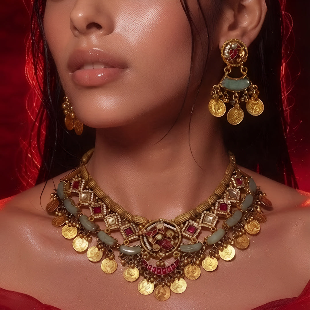 "Antique gold coin necklace set with kemp stones, green beads, and matching jhumka earrings, South Indian temple jewellery"