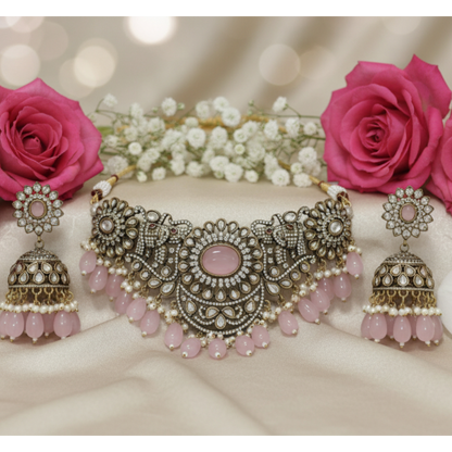 Antique oxidized choker necklace set with pink beads and floral motifs, paired with matching jhumka earrings – traditional Indian jewelry