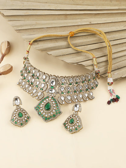 Traditional Kundan choker necklace set with green stones and matching earrings