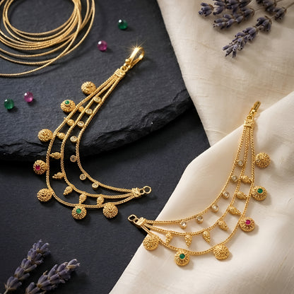 Traditional gold plated layered Kaan Chain with floral charms and red green stone accents for women, ideal for bridal wear, weddings, festive occasions, and ethnic outfits.