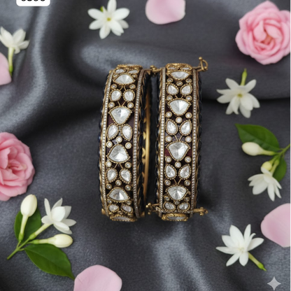 Black and white Kundan studded gold plated handcrafted bridal bangles for women