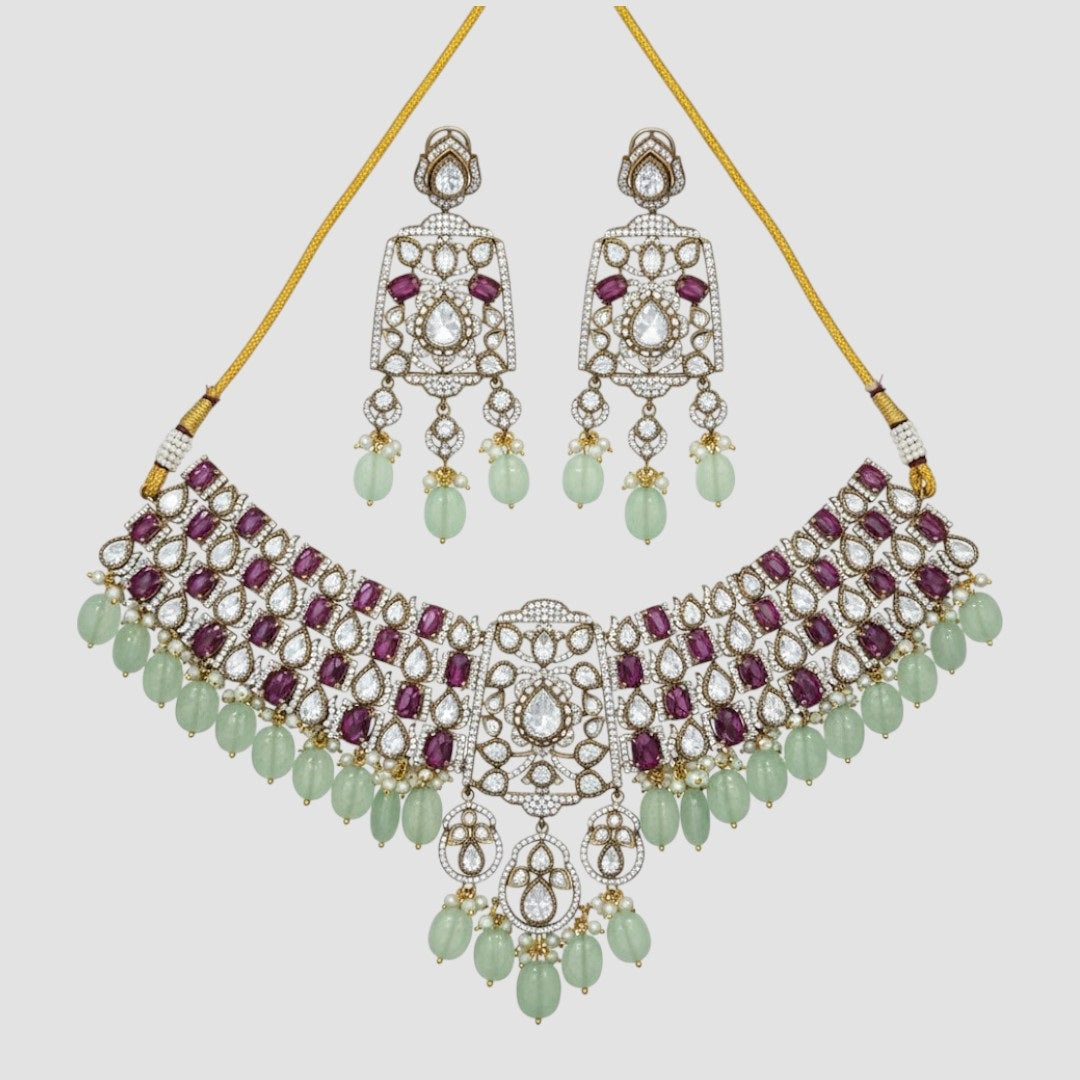 “Bridal Kundan choker necklace set with ruby stones and green beads, matching earrings”