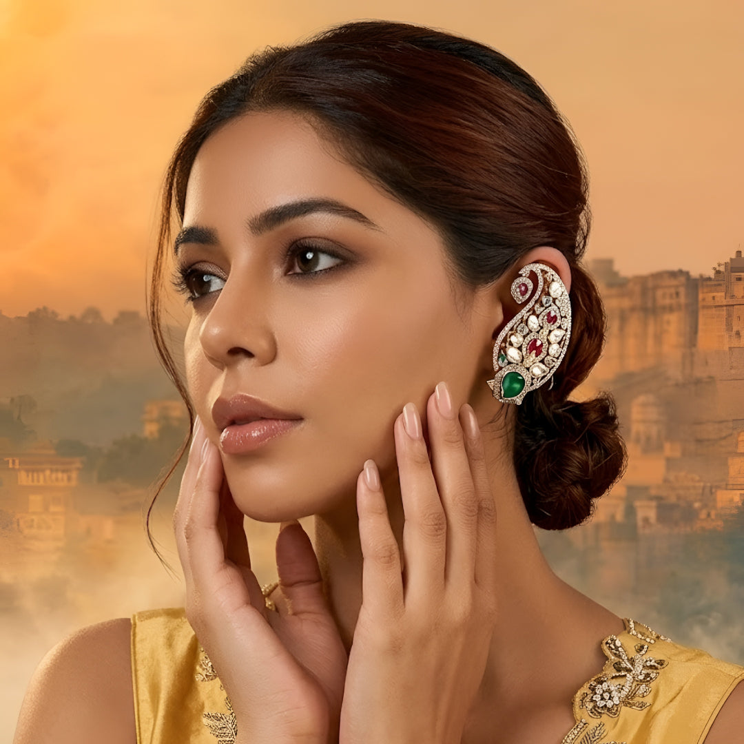 Gold-plated paisley Kundan stud earrings with pink and green stones for women