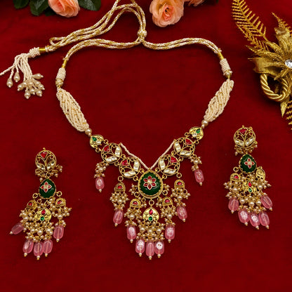 "Antique gold floral meenakari necklace with matching chandbali earrings"