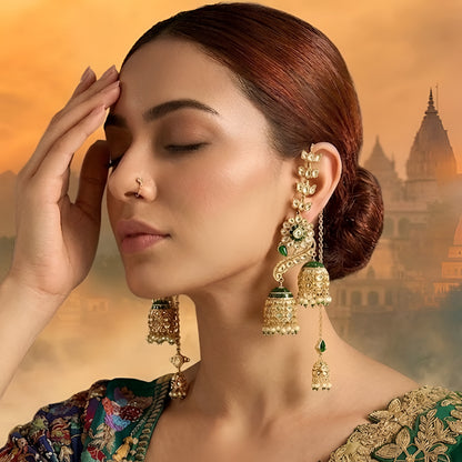 Gold-plated green Kundan peacock jhumka earrings with ear chain and double jhumka drops for bridal wear