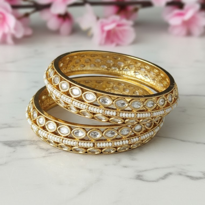 Elegant Kundan pearl-studded gold finish bangles for women – traditional bridal jewelry set