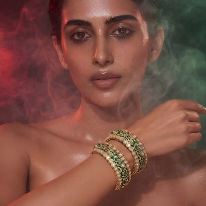Green Meenakari-inspired AD studded gold tone designer bangle set with floral detailing