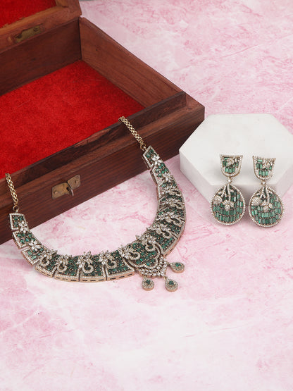 Emerald and diamond statement necklace set with matching drop earrings in gold finish