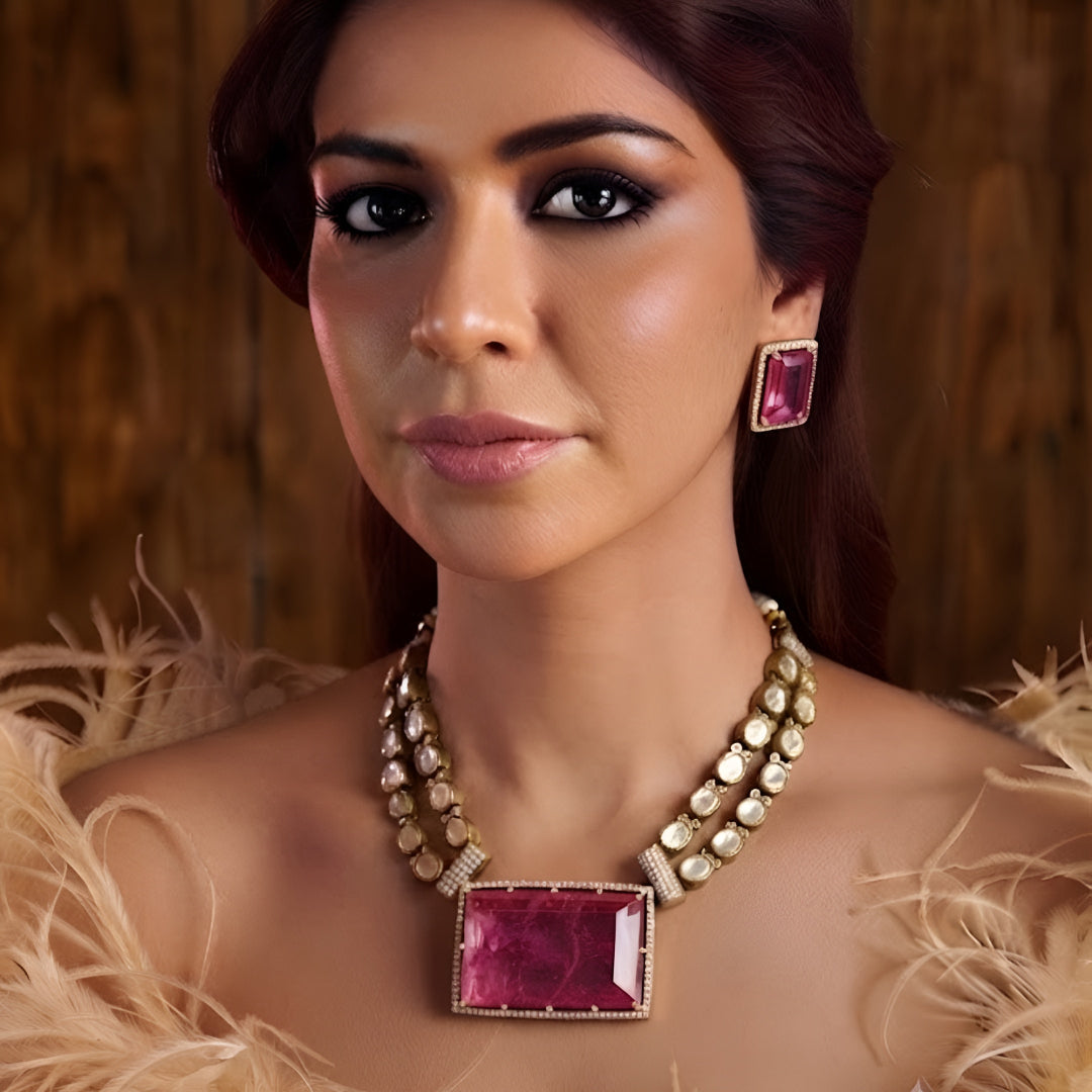 Pink crystal pendant necklace set with matching rectangular earrings in gold plating by Auraa Trends