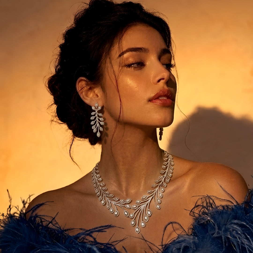 Elegant leaf design diamond necklace set with matching earrings in white gold finish, luxury bridal jewelry for weddings and special occasions.