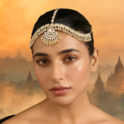 Gold-plated Kundan Matha Patti with matching Maang Tikka featuring white stones for bridal, wedding, and festive ethnic wear.