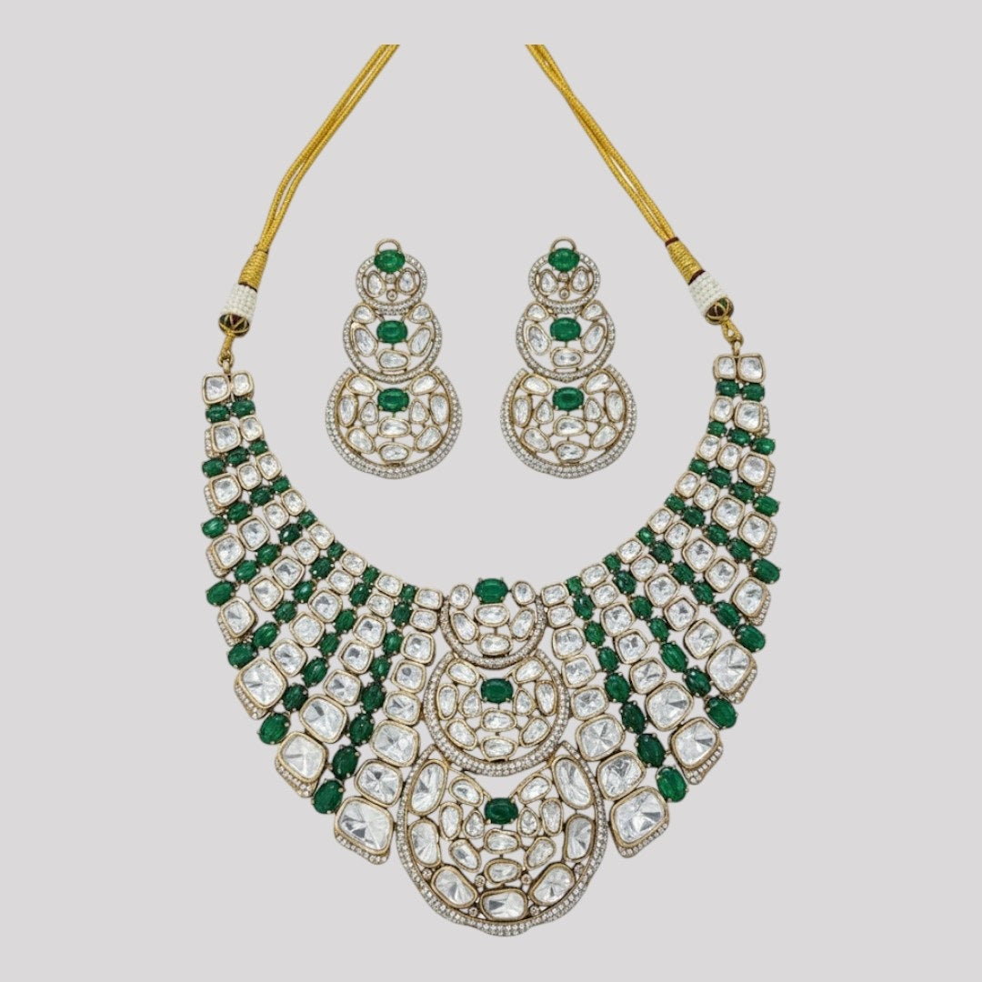 “Bridal Kundan choker necklace set with green emerald stones and matching earrings – Polki wedding jewelry