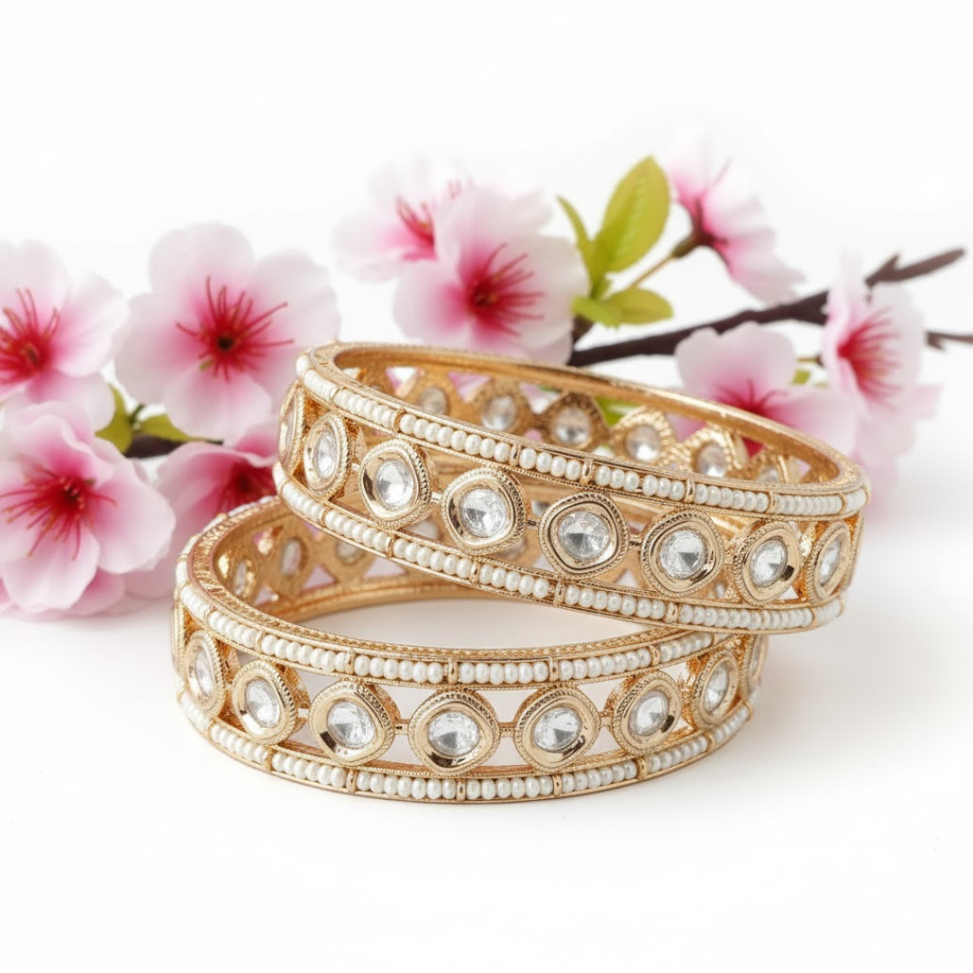 Gold-plated traditional bangles with Kundan stones and pearl embellishments for women