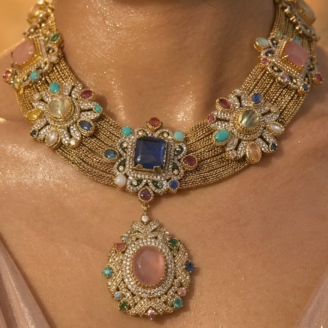 Royal Victorian antique gold statement necklace set with multicolor gemstones, pendant design, and matching earrings for women.