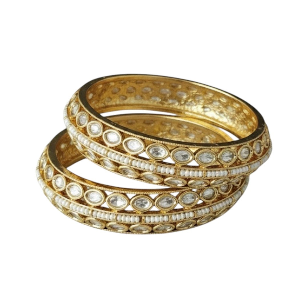 Elegant Kundan pearl-studded gold finish bangles for women – traditional bridal jewelry set