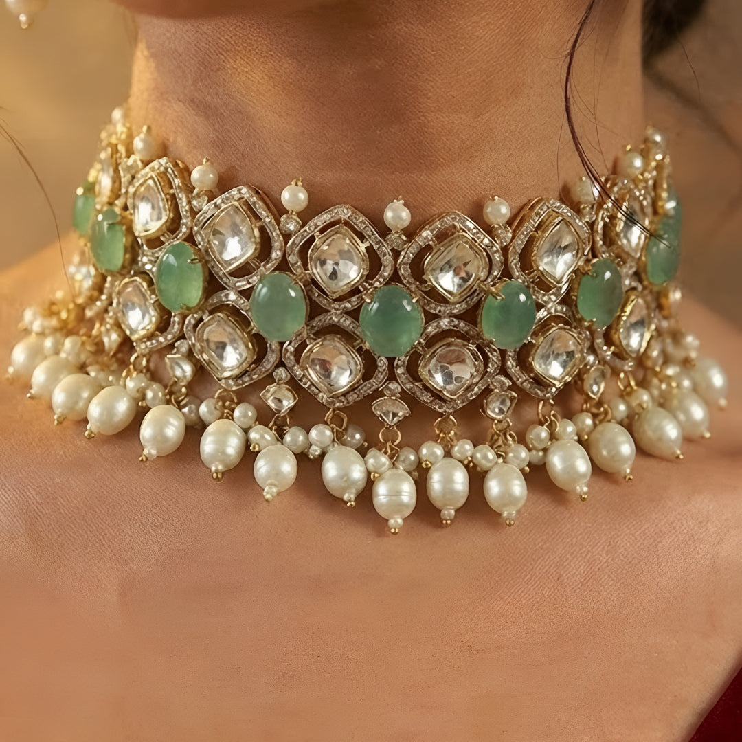Mint green Kundan pearl choker necklace set with matching dangling earrings in gold plating by Auraa Trends