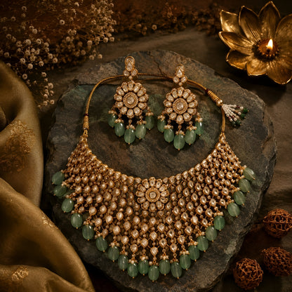 Kundan gold-plated bridal necklace set with green beads and pearl drops