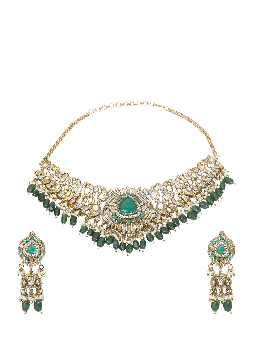 Detailed gold-toned statement necklace with intricate white stone embellishments and a prominent green teardrop centerpiece, finished with dangling green beads and pearls, paired with matching ornate drop earrings, displayed on a plain light background.