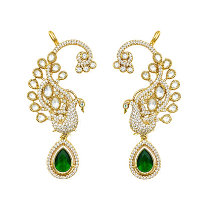 Luxury gold-plated peacock ear cuff earrings with Kundan Polki stones, sparkling CZ detailing, and emerald green teardrop crystal pendant for bridal and festive wear.