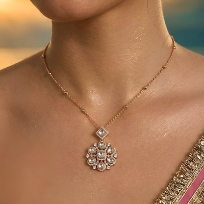 Gold-tone floral crystal pendant necklace with matching crystal earrings jewelry set featuring sparkling clear stones and elegant flower design.