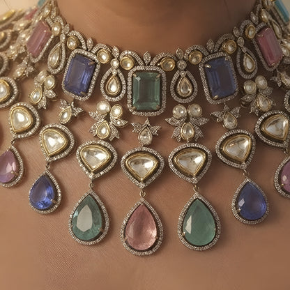 Luxury multicolor Kundan choker necklace set with matching earrings in antique gold finish for bridal, wedding, and festive wear.