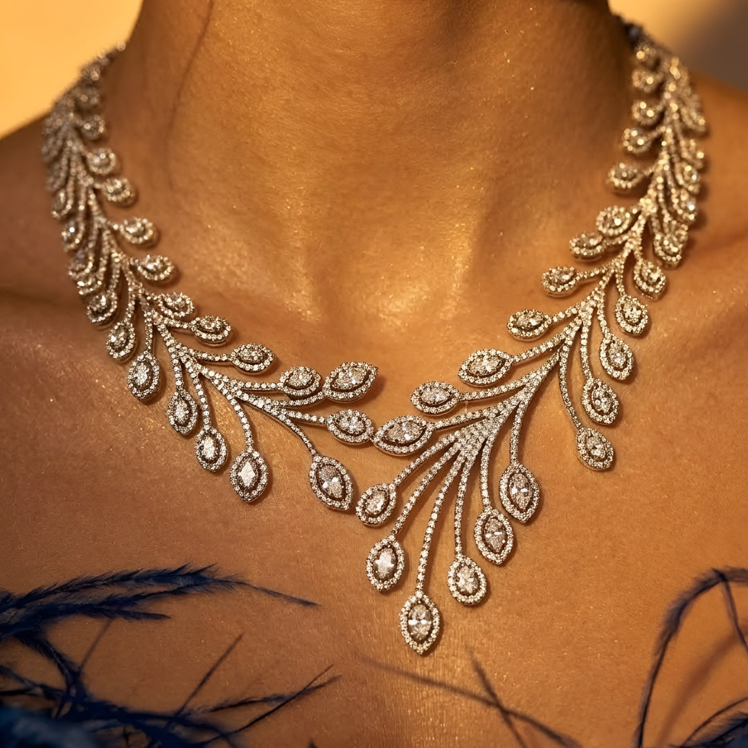 Elegant leaf design diamond necklace set with matching earrings in white gold finish, luxury bridal jewelry for weddings and special occasions.