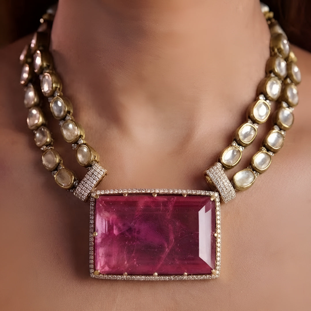 Pink crystal pendant necklace set with matching rectangular earrings in gold plating by Auraa Trends