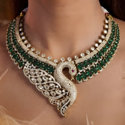 Luxury green swan designer necklace set with American diamonds, emerald green stones, and matching swan earrings for bridal wedding and party wear.