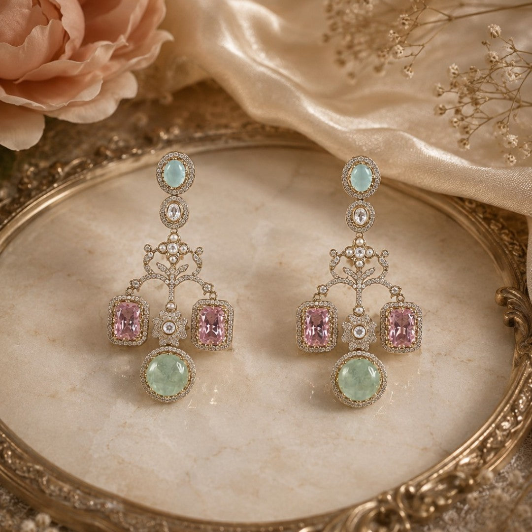 Luxury gold plated pastel green and pink stone statement earrings with American diamonds for women, designer wedding and party wear jewelry.