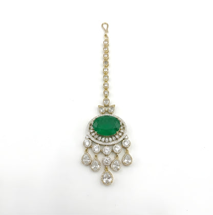 Luxury Green Stone Polki Bridal Maang Tikka with American Diamond Stones and Gold Finish for Wedding & Festive Wear.
