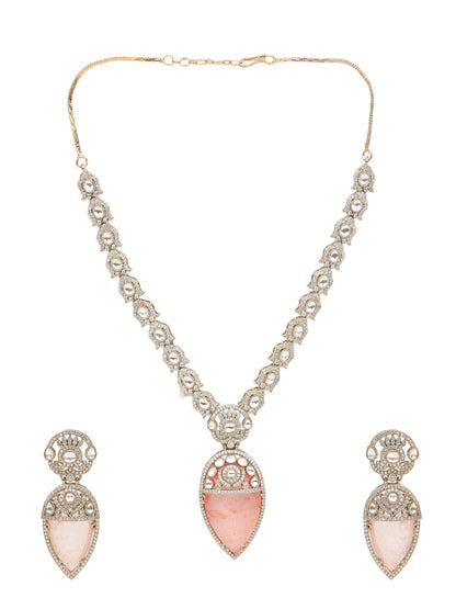 Gold-plated necklace set with peach teardrop pendant and matching statement earrings for bridal and festive wear