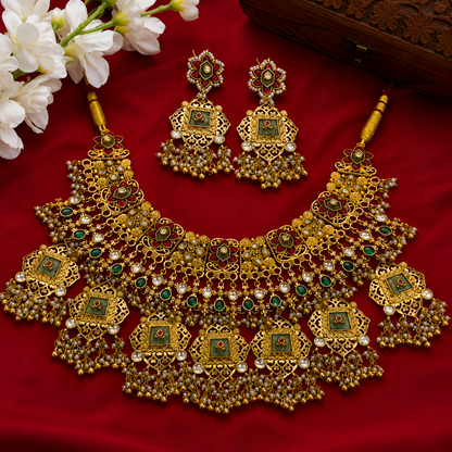 Antique gold filigree bridal choker set with ruby and green stones
