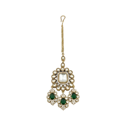 Gold-plated Kundan Maang Tikka featuring a square white center stone with emerald green teardrop stones and intricate floral detailing for bridal and festive wear.