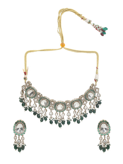 Elegant gold-tone choker necklace set with large mirror-polished stones, green bead accents, and pearl detailing, paired with matching dangling earrings