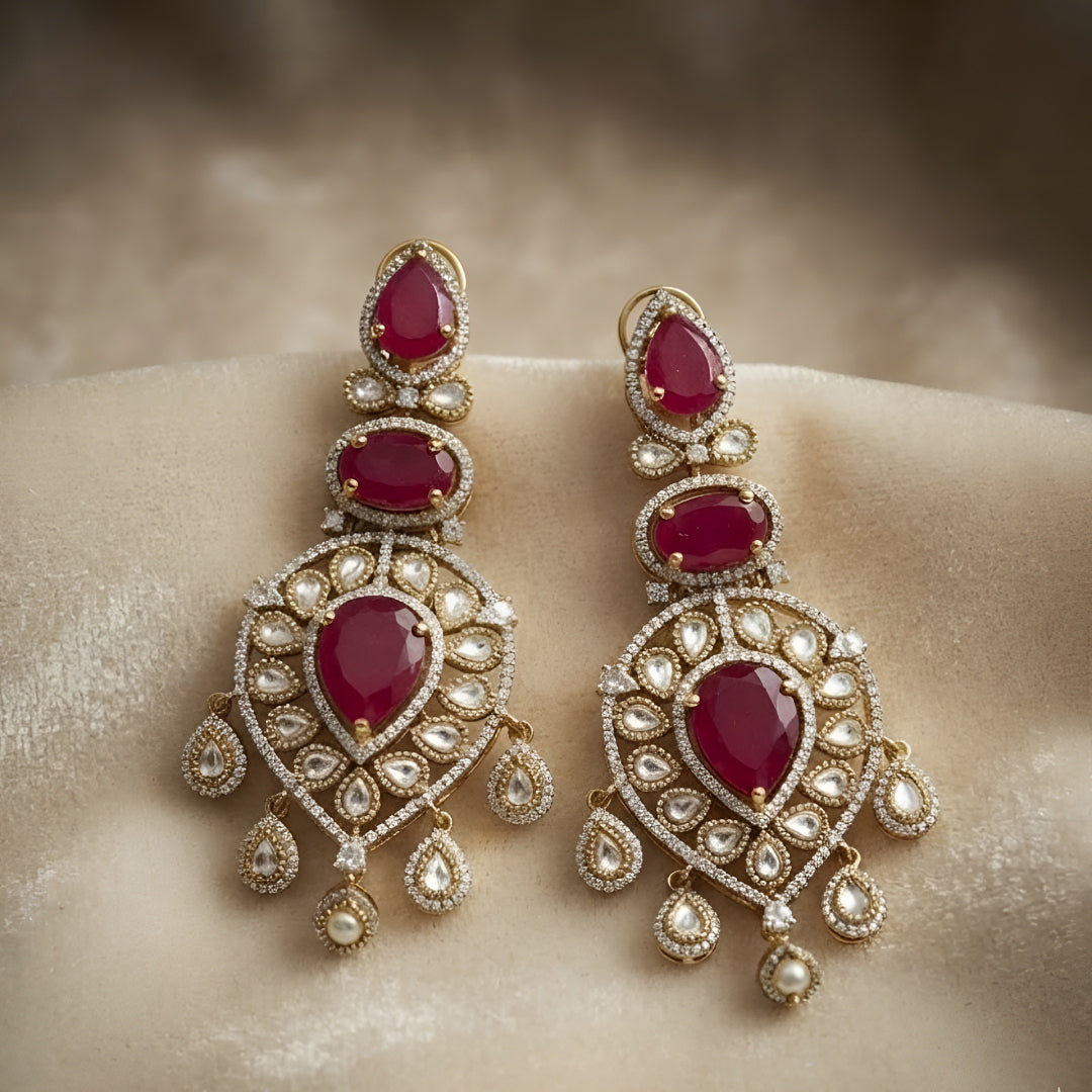 Ruby red stone and Polki gold plated chandelier earrings for women, bridal wedding statement ethnic jewelry with dangling drops.
