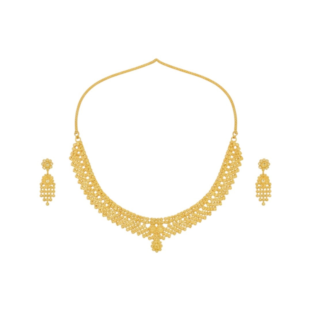 Elegant gold-plated necklace set with pearl-style bead design and matching earrings displayed on a red velvet stand.