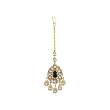 Gold-plated Kundan Maang Tikka with emerald green teardrop stone and white Kundan detailing for bridal and festive wear.
