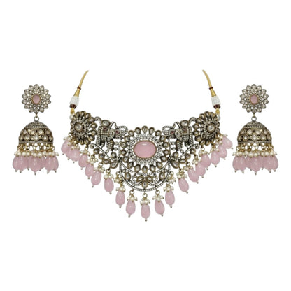 Antique oxidized choker necklace set with pink beads and floral motifs, paired with matching jhumka earrings – traditional Indian jewelry