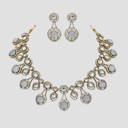 “Gold-plated white stone kundan necklace set with matching earrings for women, bridal and festive wear.”