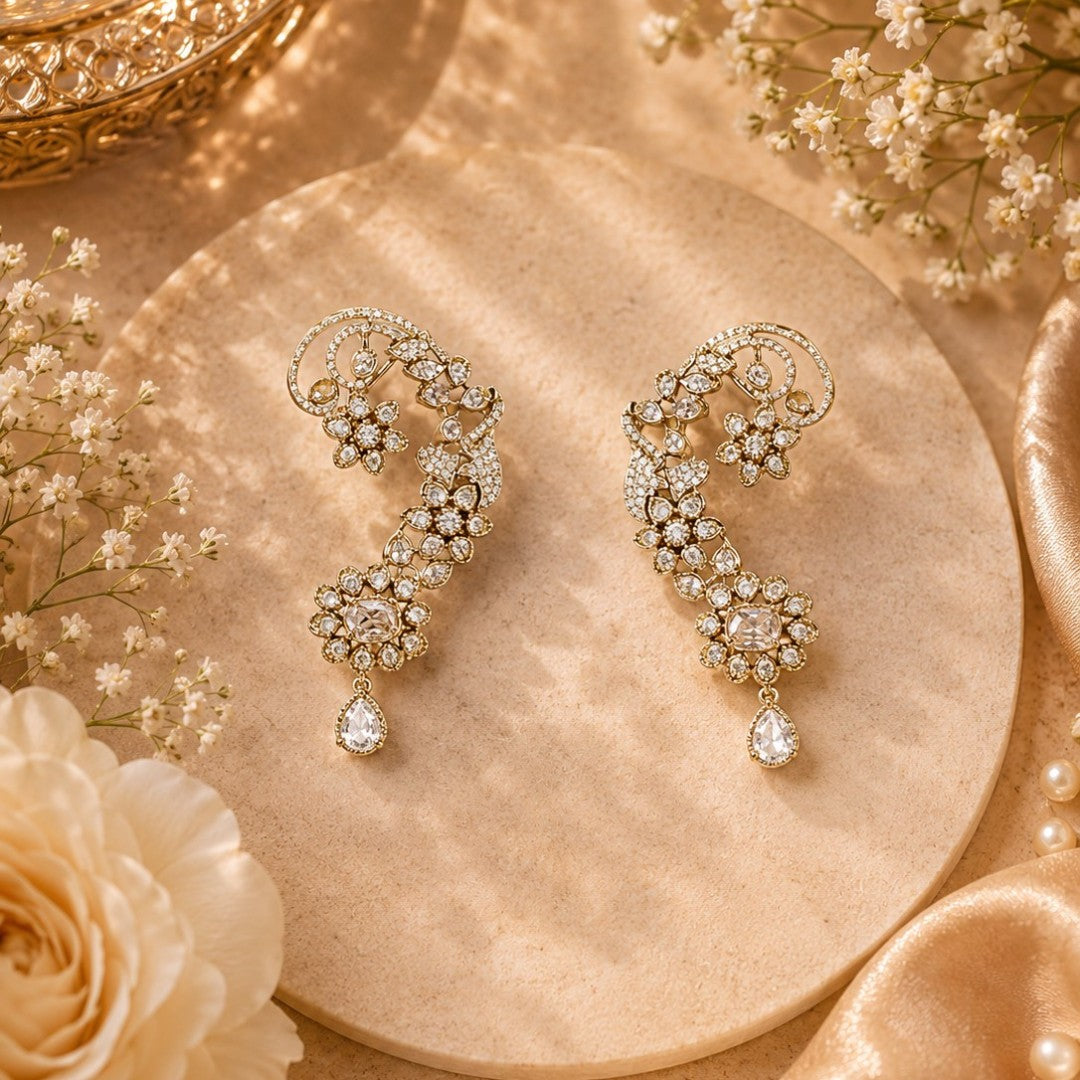 Gold-plated Kundan ear cuff earrings with floral crystal design and teardrop danglers for women