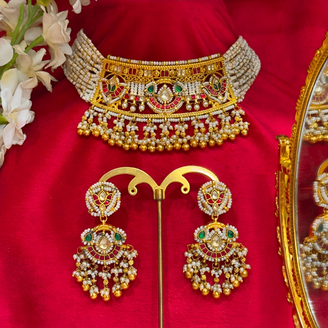 Traditional bridal jewellery set with pearl strands and matching jhumka earrings