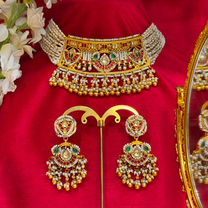 Traditional bridal jewellery set with pearl strands and matching jhumka earrings