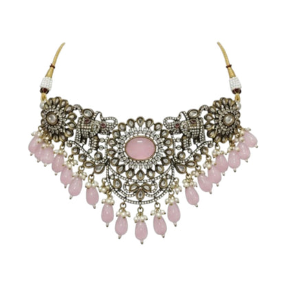 Antique oxidized choker necklace set with pink beads and floral motifs, paired with matching jhumka earrings – traditional Indian jewelry