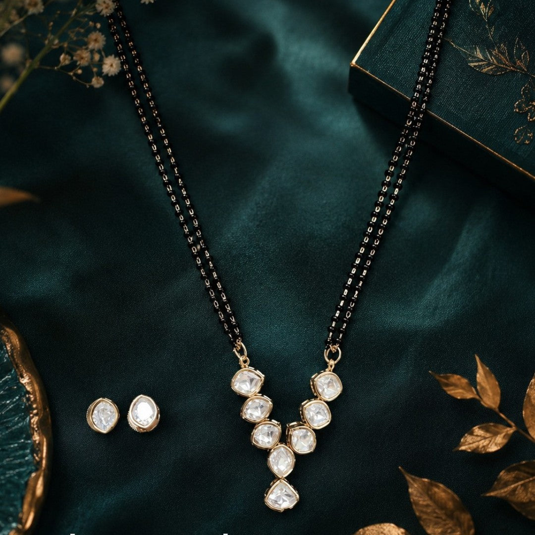 Elegant pear stone black beads mangalsutra necklace set with matching stud earrings in gold-tone finish for women